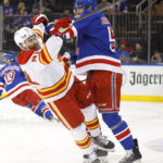 Lafreniere scores in OT to lift Rangers over Flames 5-4