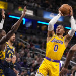 James closes in on scoring record, Lakers rally past Pacers