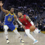 Poole, Thompson rally Warriors back to beat Blazers 123-105