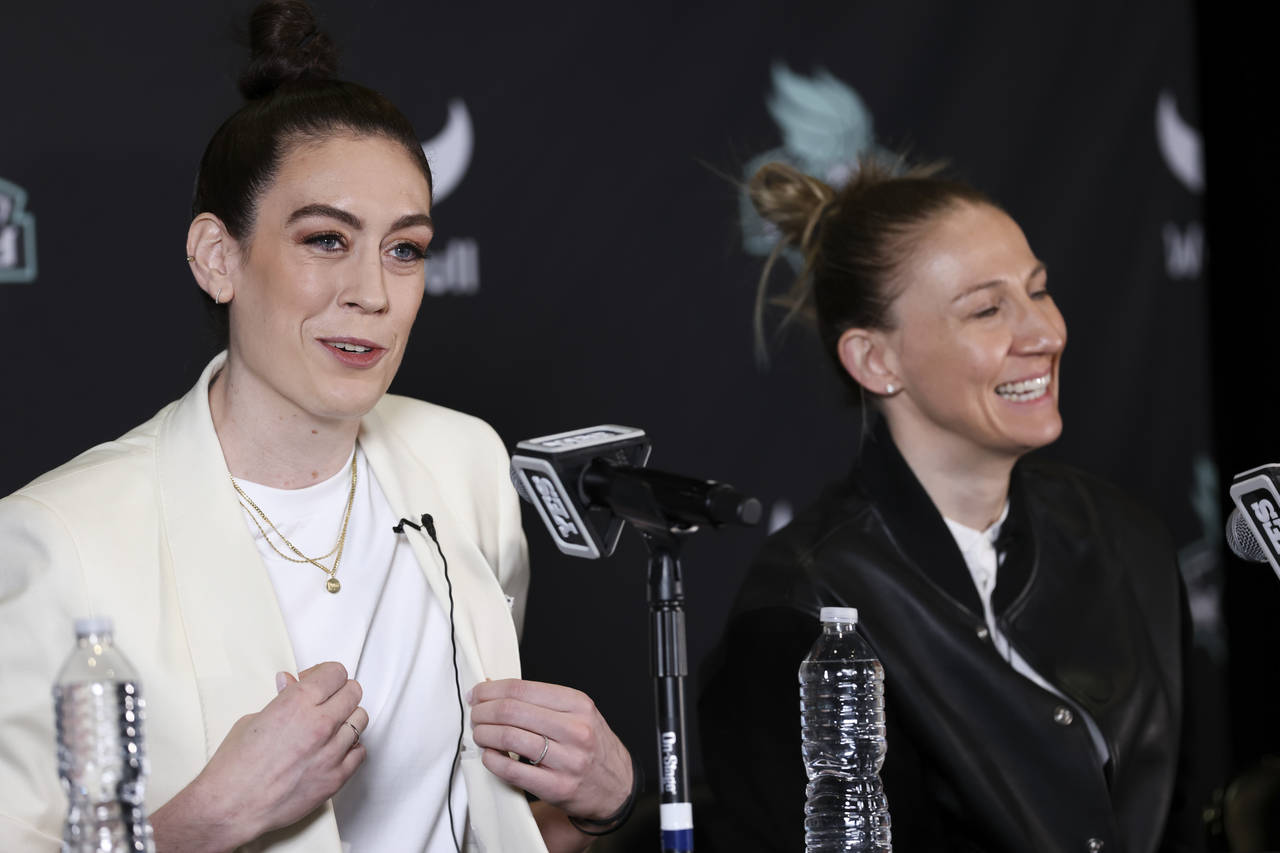 New York Liberty forward Breanna Stewart, left, and guard Courtney Vandersloot participate in a WNB...