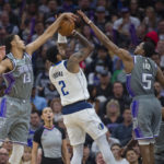 Fox scores 36 points, Kings beat Mavericks 133-128 in OT