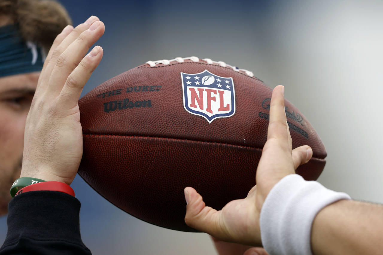 Seniors from NCAA colleges run through drills to increase their status for the NFL Draft during pra...