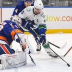 Pettersson scores 2, Canucks beat Isles to snap 2-game skid