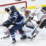 Wheeler scores 2 to lead Jets in 4-1 win over Blackhawks