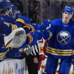 Flames get hot in 2nd period for 7-2 win over Sabres