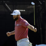 Rahm holds on to win at Riviera and return to No. 1 in world