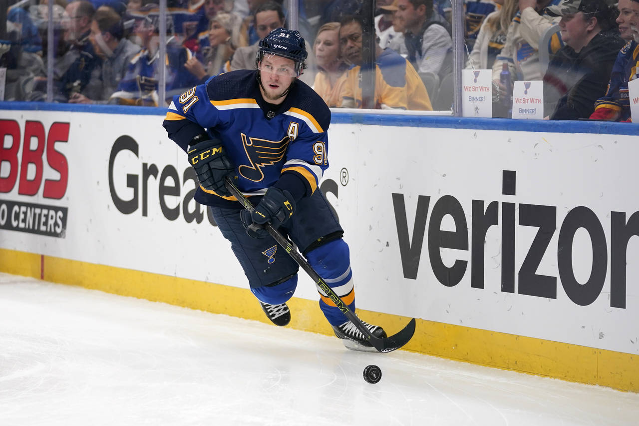 FILE -  St. Louis Blues' Vladimir Tarasenko (91) handles the puck during the first period in Game 6...