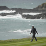 Kitayama leads Pebble Beach as the worst of the wind looms