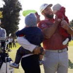 Rahm holds on to win at Riviera and return to No. 1 in world