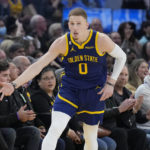 Thompson, Warriors' supporting cast hold off Timberwolves