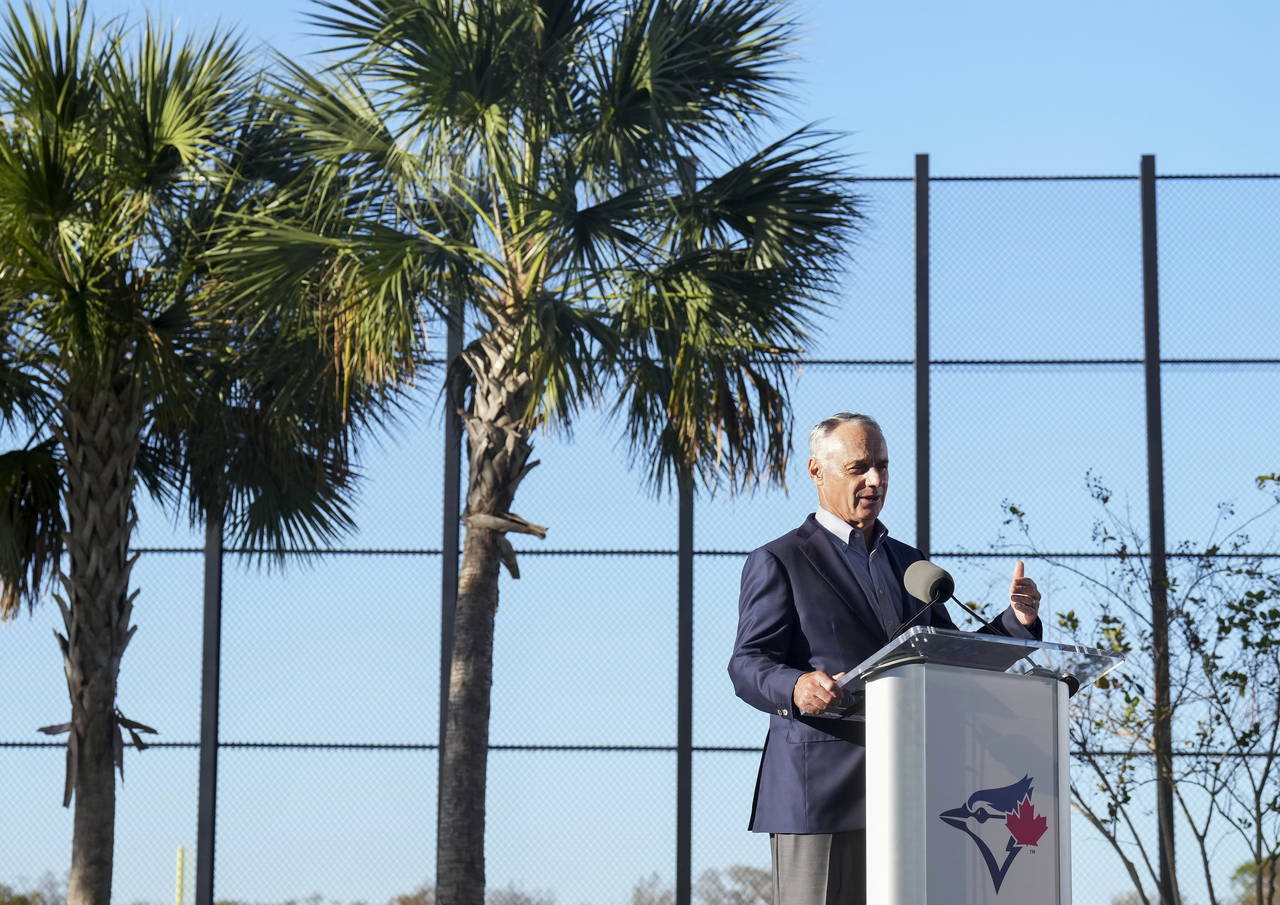 MLB Commissioner Rob Manfred speaks to the media and answers questions during baseball spring train...