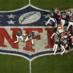 Super Bowl field turns into a super slip and slide