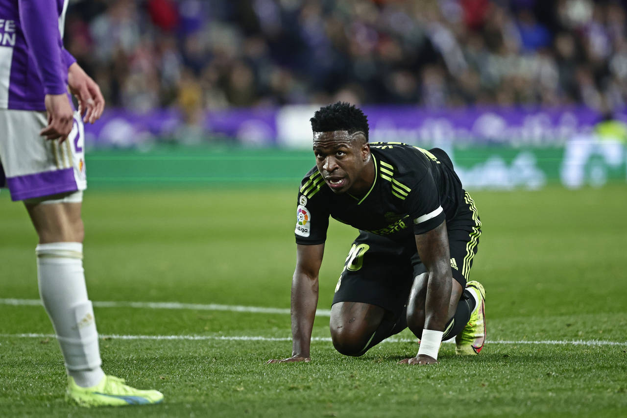 FILE - Real Madrid's Vinicius Junior gets up from the ground during a Spanish La Liga soccer match ...