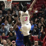 Nikola Jokic scores 27, Nuggets hold off Heat 112-108