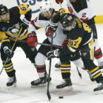 Nico Hischier leads Devils past weary Penguins, 5-2