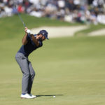 Rahm holds on to win at Riviera and return to No. 1 in world