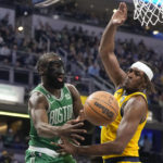 Tatum has 31, breaks tie late in OT, Celtics outlast Pacers