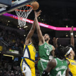 Tatum has 31, breaks tie late in OT, Celtics outlast Pacers