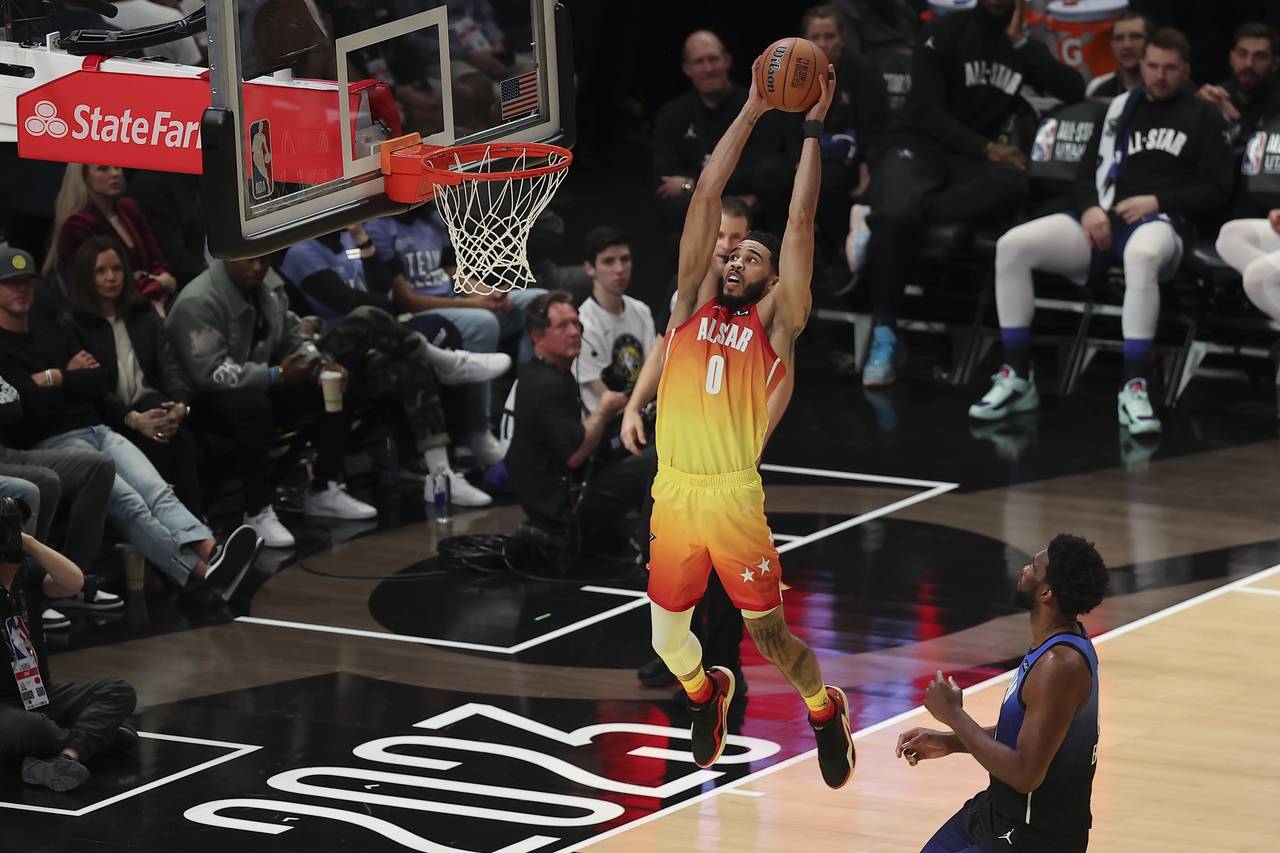Team Giannis forward Jayson Tatum (0) dunks during the second half of the NBA basketball All-Star g...