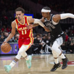 Young, Hunter pace Hawks past reeling Spurs 125-106