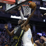 Russell shines in return to Lakers after trade by T-Wolves