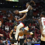 Butler's dunk at end gives Heat 97-95 win over Rockets