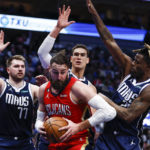 Mavs hang on after Doncic hurt, hand Pels 10th straight loss