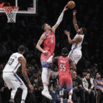 Thomas helps Nets rally from 23 down to beat Wizards 125-123