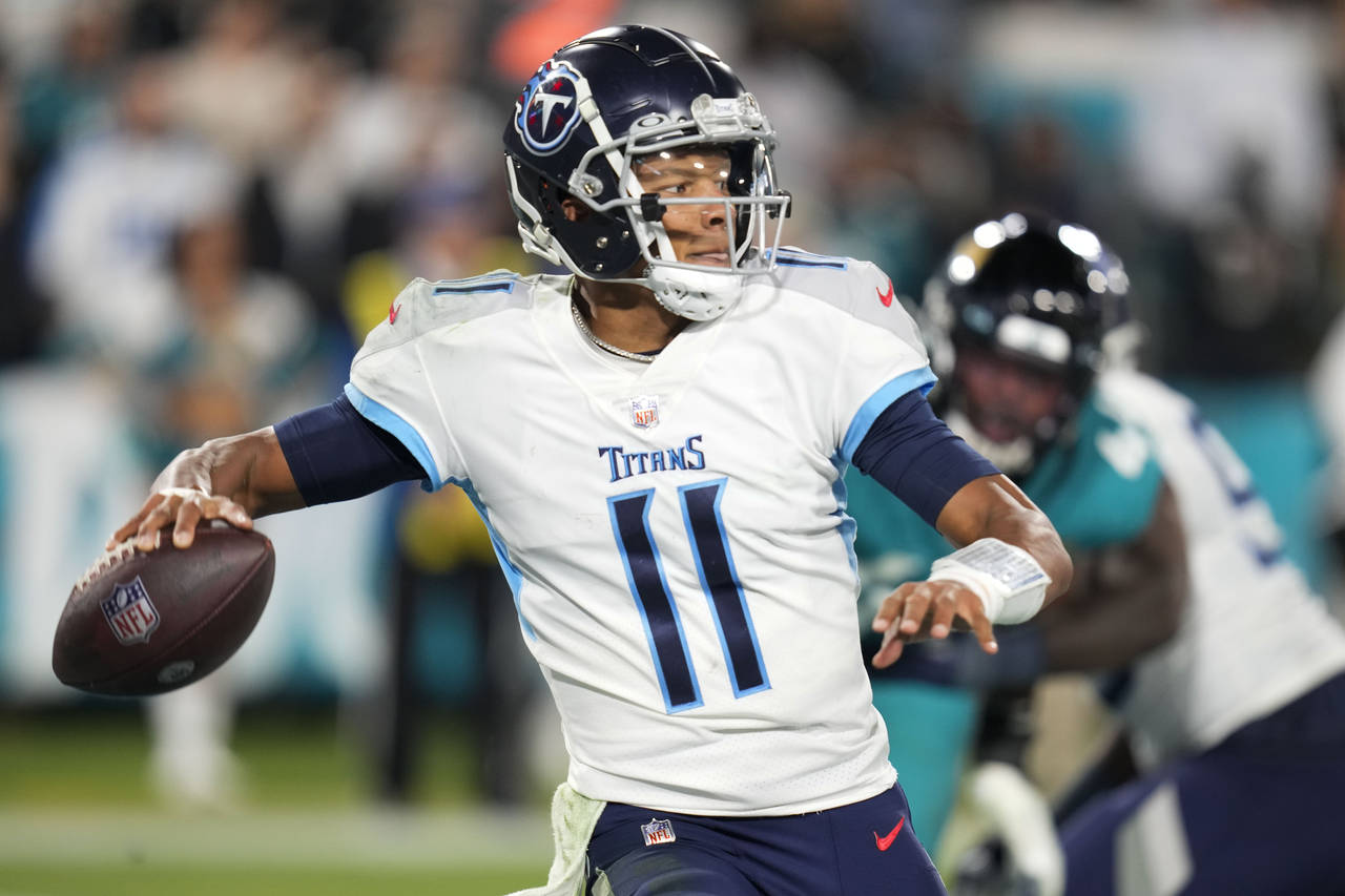 FILE -Tennessee Titans quarterback Joshua Dobbs (11) passes in the second half of an NFL football g...