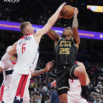Porzingis makes eight 3s as Wizards beat Hornets, end skid
