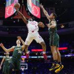 Tatum's late 3 lifts Celtics past Embiid, 76ers 110-107