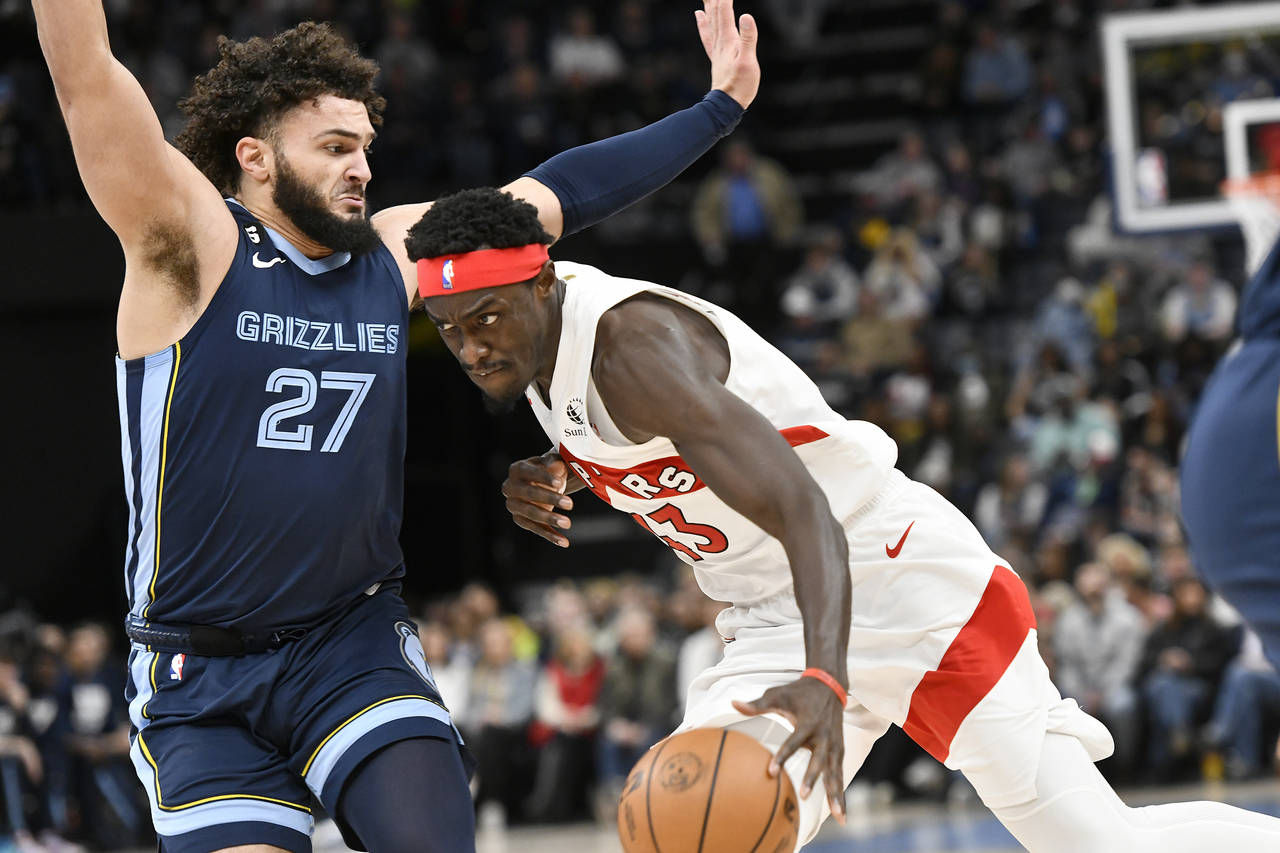 Toronto Raptors forward Pascal Siakam (43) drives against Memphis Grizzlies forward David Roddy (27...