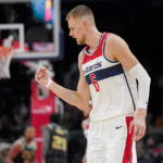 Porzingis makes eight 3s as Wizards beat Hornets, end skid