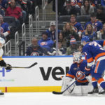 Parise scores late, Nelson nets 2 as Islanders edge Penguins