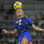 US women beat Canada 2-0, show support in labor dispute