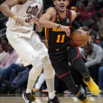Hawks pull away in 1st half, rout Cavaliers 136-119
