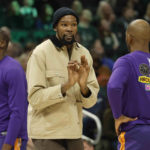 Bucks outlast Suns 104-101 for 14th consecutive victory