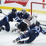 Wheeler scores 2 to lead Jets in 4-1 win over Blackhawks