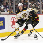 Bruins goaltender Linus Ullmark scores into empty net