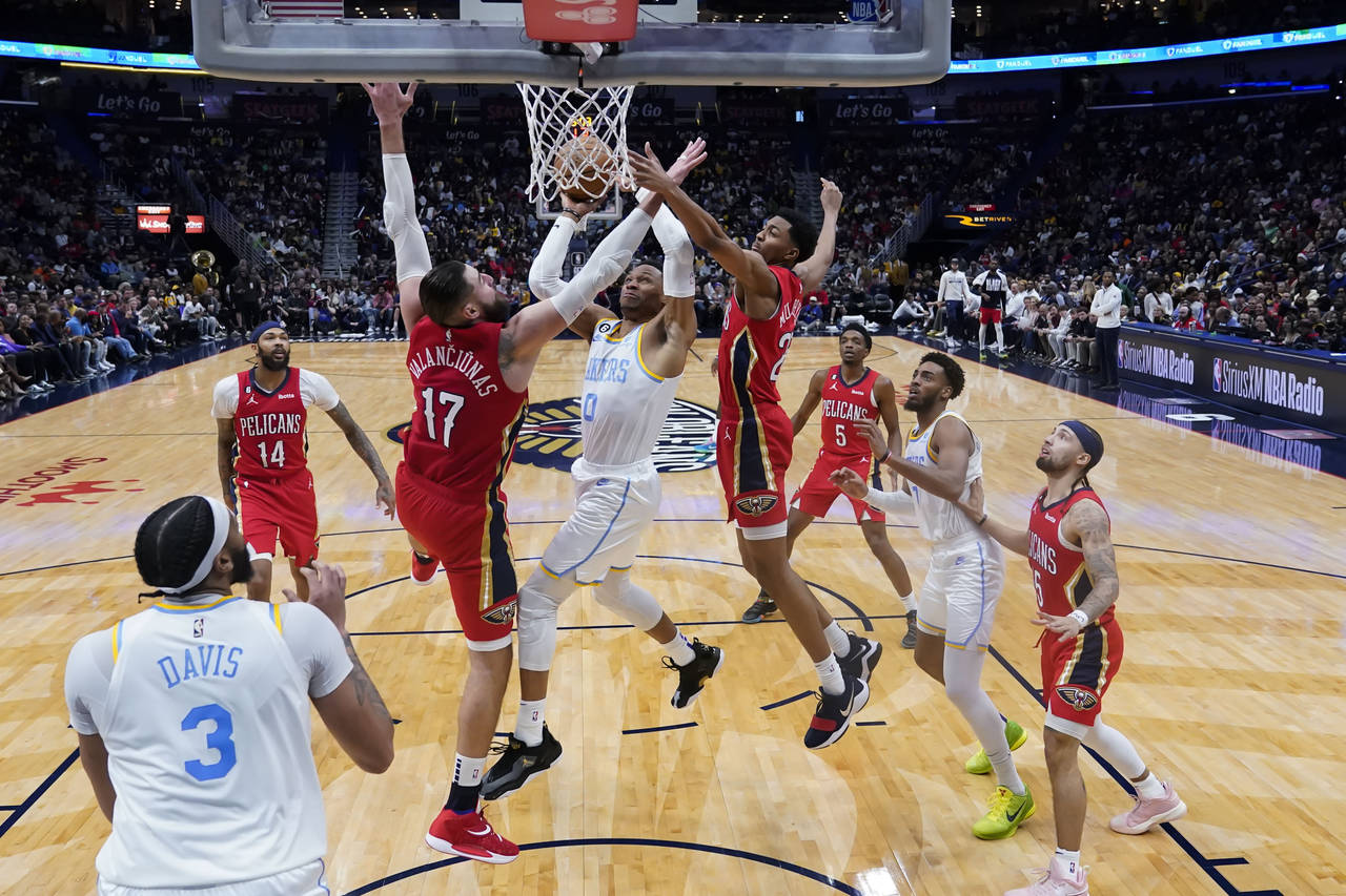 Los Angeles Lakers guard Russell Westbrook (0) goes to the basket in the second half of an NBA bask...