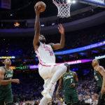 Tatum's late 3 lifts Celtics past Embiid, 76ers 110-107