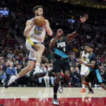 Lillard has triple-double, Blazers rally late past Warriors