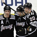 Bratt power-play OT goal gives Devils 5-4 win over Canucks