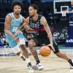 Ball fractures ankle in Hornets' 117-106 win over Pistons