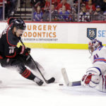 Panarin's 4-goal night helps Rangers stop Hurricanes' streak