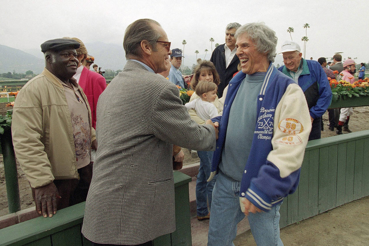 FILE - Actor Jack Nicholson, left, congratulates Academy Award-winner composer Burt Bacharach in th...