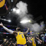 LeBron James chases NBA history on a star-filled night in LA