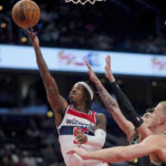 Porzingis makes eight 3s as Wizards beat Hornets, end skid