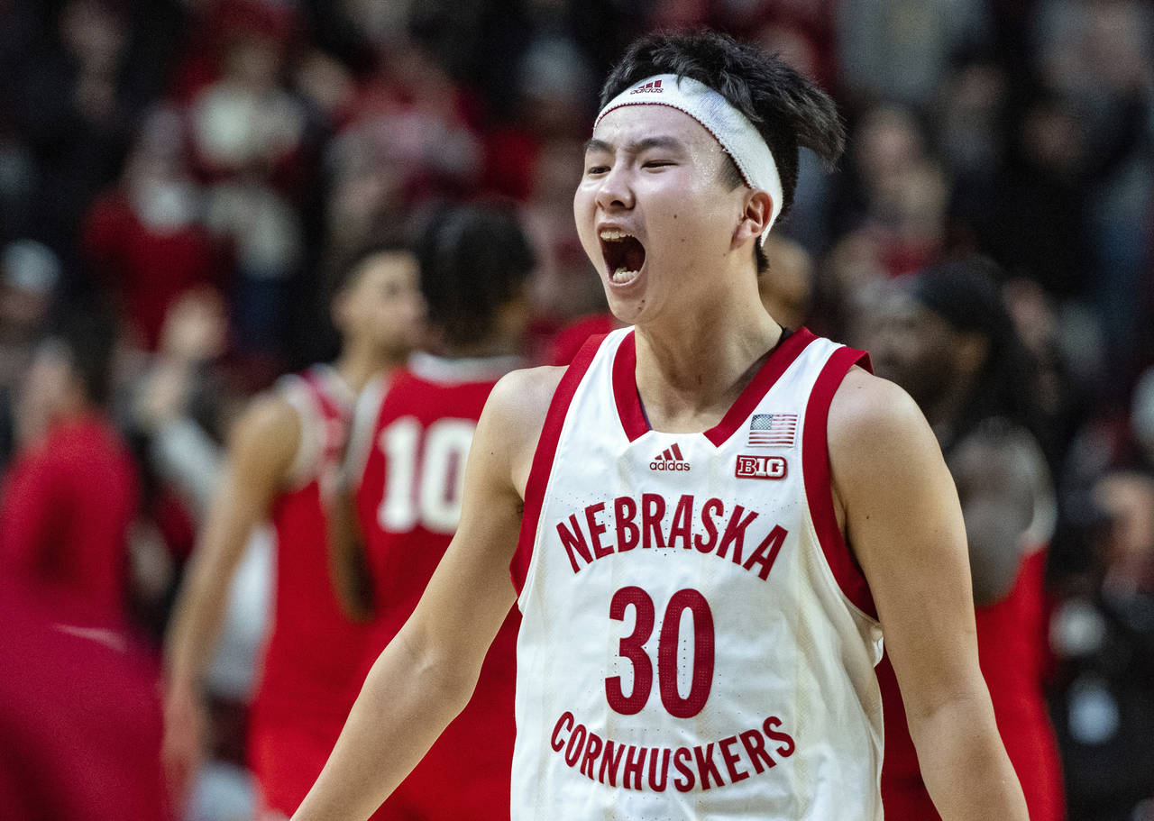 FILE.- Nebraska's Keisei Tominaga, of Japan,  celebrates the team's win over Ohio State in an NCAA ...