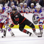 Panarin's 4-goal night helps Rangers stop Hurricanes' streak